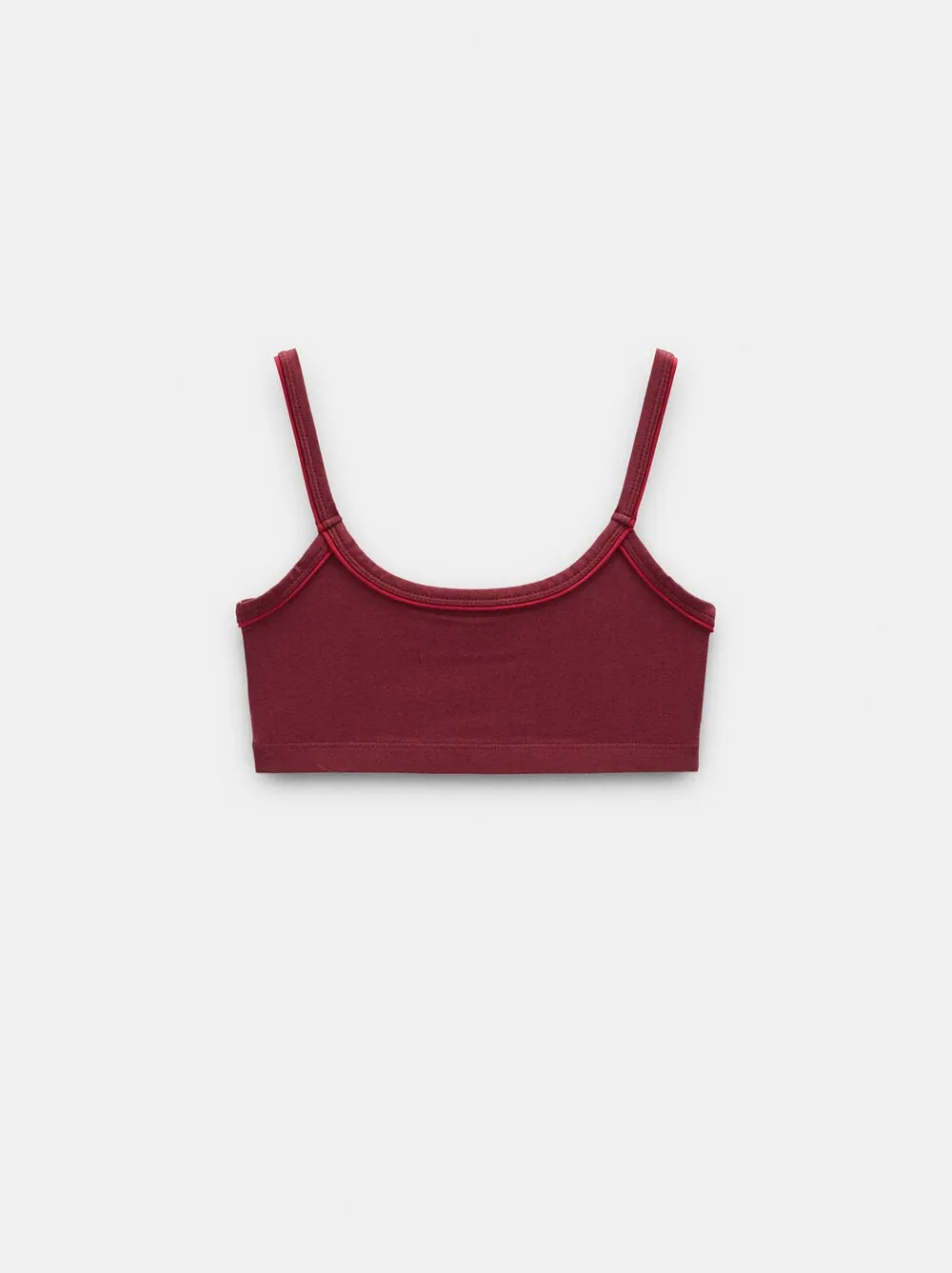Top with thin straps and contrasting piping