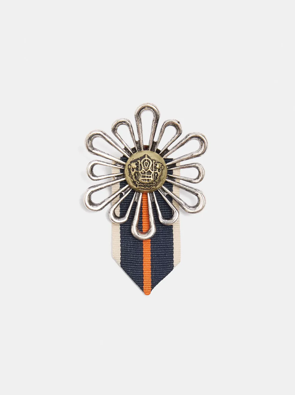 Flower brooch with badge