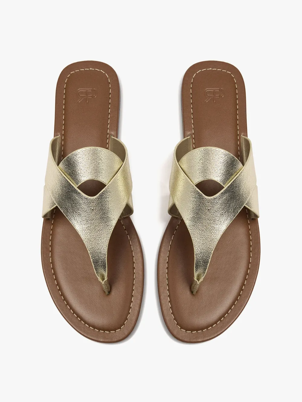 Flat sandals with crossed straps